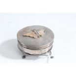 Silver trinket box, Birmingham marks rubbed, of oval form, the hinged lid with depiction of a