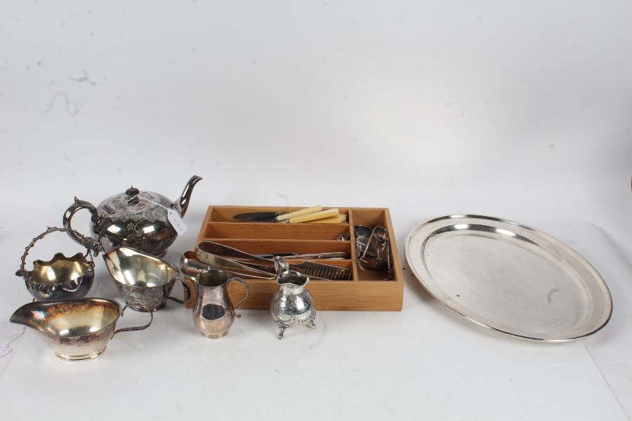 Silver plated ware, to include oval tray teapot, two sauceboats, sugar bowl, cased fish knives and