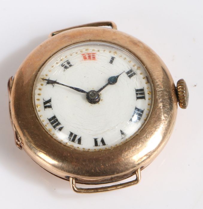 9 carat gold cased mid early 20th century wristwatch, with a white dial and Roman numerals, gross