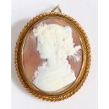 Yellow metal cameo brooch, the cameo depicting a classical lady together with a twisted unmarked