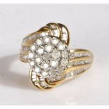 9 carat gold and diamond cluster ring, the head set with many round cut and baguette stones,