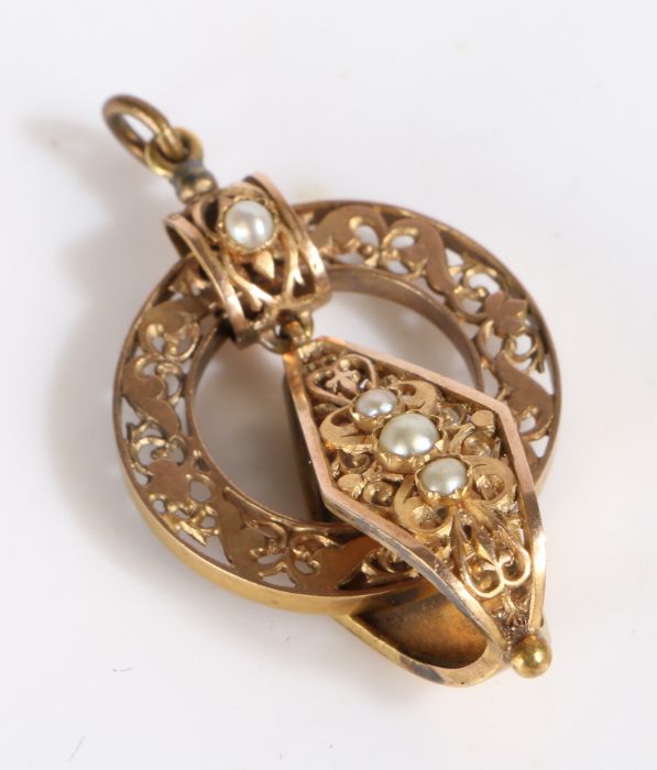 Victorian yellow metal and pearl pendant, with a foliate pierced design set with four pearls, weight