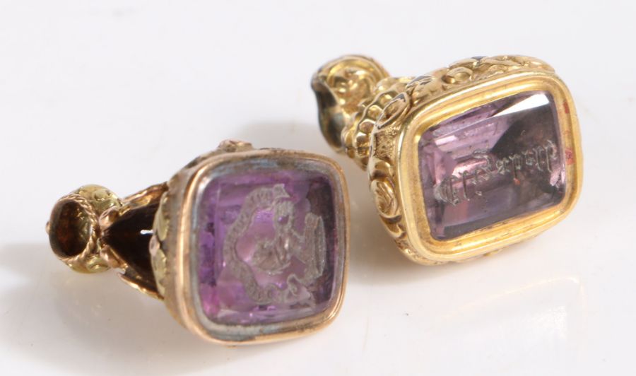 Two yellow metal and amethyst fob seals, both with foliate decoration and set with amethyst to the - Image 2 of 2