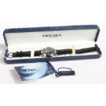 Delma gentleman's stainless wristwatch, the signed black sunburst effect dial with chrome tapering