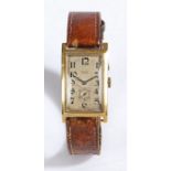 Bennett London 18 carat gentleman's wristwatch, circa 1920, the signed dial with Arabic numerals,
