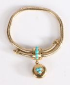 A Victorian yellow metal turquoise set bracelet, with a circular pendant set with three turquoise