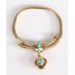 A Victorian yellow metal turquoise set bracelet, with a circular pendant set with three turquoise