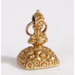 Gold coloured metal fob seal, with cast foliate, shell and acanthus leaf decoration, with vacant