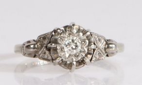 18 carat white gold and diamond ring comprised of an elaborate gallery featuring a tall claw setting