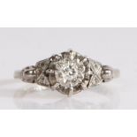 18 carat white gold and diamond ring comprised of an elaborate gallery featuring a tall claw setting