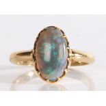 A black opal ring, the cabochon cut opal within a claw setting, 4.2 grams, ring size Q