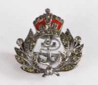 A Naval sweetheart brooch, with an enamel crown over the anchor set with paste, 24mm diameter
