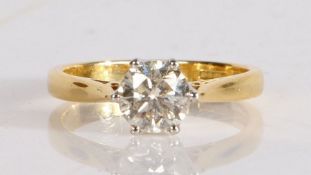 An 18 carat gold diamond solitaire ring, the round cut diamond at approximately 1 carat, 3.6