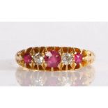 A 19th Century 18 carat gold diamond and ruby set ring, with three rubies and two diamonds to the