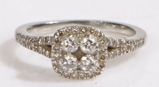A platinum diamond cluster halo ring, total diamond approximately 0.40 carat Ring size I. Weighing