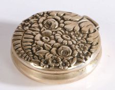 Tiffany & Co sterling silver powder compact, of circular form with embossed foliate cover, the