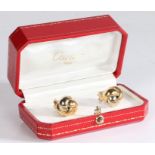 A pair of Cartier 'noeud Anglais' Trinity knot clip earrings, in 18 carat white, yellow and rose