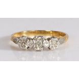 18 carat gold and diamond three stone ring, the three old cut diamonds, set in decorative white