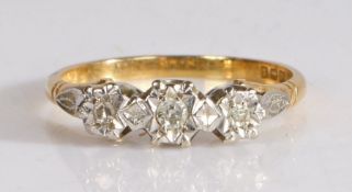 18 carat gold and diamond three stone ring, the three old cut diamonds, set in decorative white