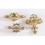 Three peridot and pearl brooches, to include a 9 carat gold peridot brooch with swags set with