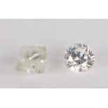 A parcel of two loose diamonds, one round brilliant cut at approximately 0.25 carat and one rough