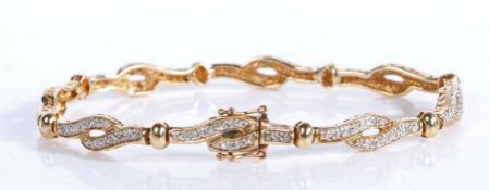 9 carat gold diamond encrusted bracelet, formed from overlapping serpentine links, 11.3g