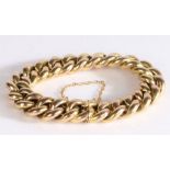 14 carat gold curb link bracelet, with links and clasp end and safety chain, 31.1g, 19cm long