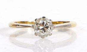 18 carat gold and platinum set diamond solitaire ring, the claw set diamond measuring 0.70ct, ring