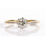 18 carat gold and platinum set diamond solitaire ring, the claw set diamond measuring 0.70ct, ring