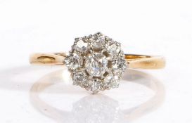 18 carat gold and diamond ring, the central diamond surrounded by a band of eight diamonds, ring