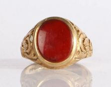 A 9 carat gold carnelian set ring, with an oval cut carnelian, 5.66 grams, ring size L