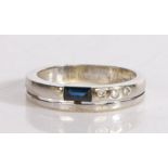 9 carat white gold, sapphire and diamond ring, the horizontal pierced band set with a single