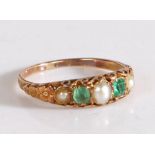 An emerald and pearl set ring, with three pearls and two emerald cut emeralds to the scroll and