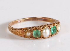 An emerald and pearl set ring, with three pearls and two emerald cut emeralds to the scroll and