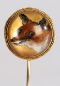 A Victorian Essex crystal fox head stick pin, the domed head with an image of a fox with ripe