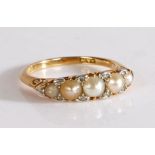 A Victorian 18 carat gold pearl and diamond set ring, with a row of five pearls and eight diamonds