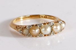 A Victorian 18 carat gold pearl and diamond set ring, with a row of five pearls and eight diamonds