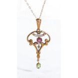 Art Nouveau pendant necklace, the peridot, garnet and seed pearl set pendant on a 9 carat gold