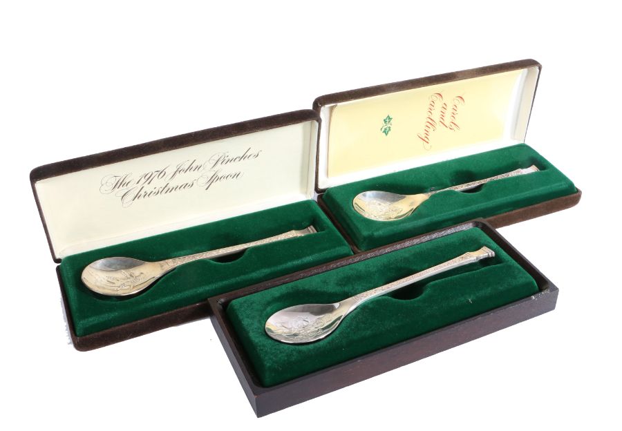 Three John Pinches Christmas spoons, London 1975, 1976, Sheffield 1977, all housed in fitted