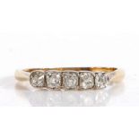 Antique unmarked yellow and white metal ring, the head set with five diamonds, ring size K1/2, 1.8g