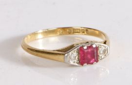 18 carat gold ruby and diamond set ring, the central ruby flanked by a diamond to either side, 1.8