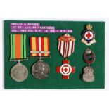 Second World War trio of medals, the Defence Medal, British Red Cross Service Medal with one bar,