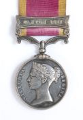 2nd China War Medal with clasp 'Canton 1857' (W.E. BATES) presumably issued unnamed to a member of