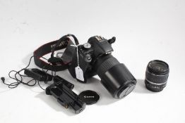 Canon EOS REBEL T1i camera with Sigma DL macro super 70-300mm 1:4-5.6 lens, battery grip, additional