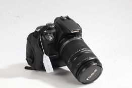 Canon EOS 350D camera with Canon EFS 55-250mm 1.1m/3.6ft 1:4-5.6 IS lens and battery grip