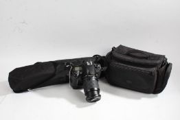 Nikon D100 camera with Nikon AF NIKKOR 28-100mm 1:3.5-5.6G lens, battery grip, camera bag and tripod