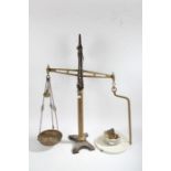 A set of balance scales, with a porcelain platform and brass dish 86cm high