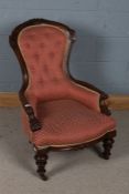 Good Victorian mahogany and upholstered nursing chair, with a foliate carved and poker work cresting