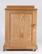 Victorian pine cupboard, the panelled cupboard door opening to reveal four graduated drawers with