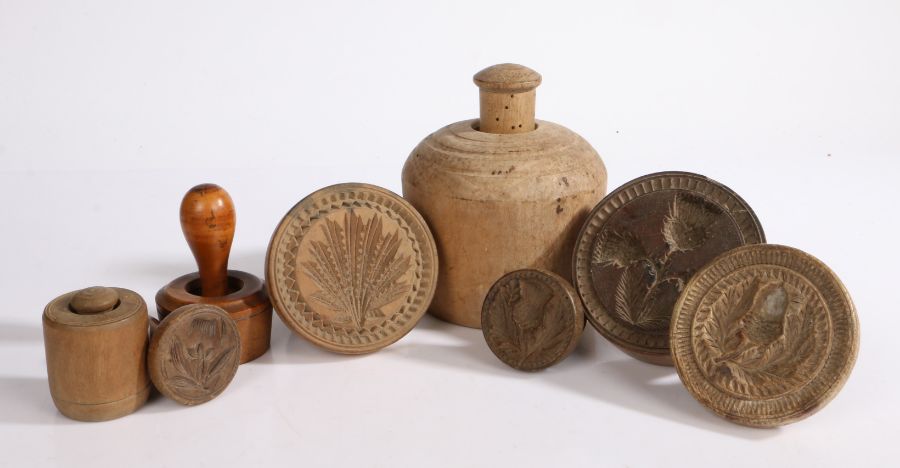 A collection of 19th century wooden butter moulds, various sizes and patterns (8)